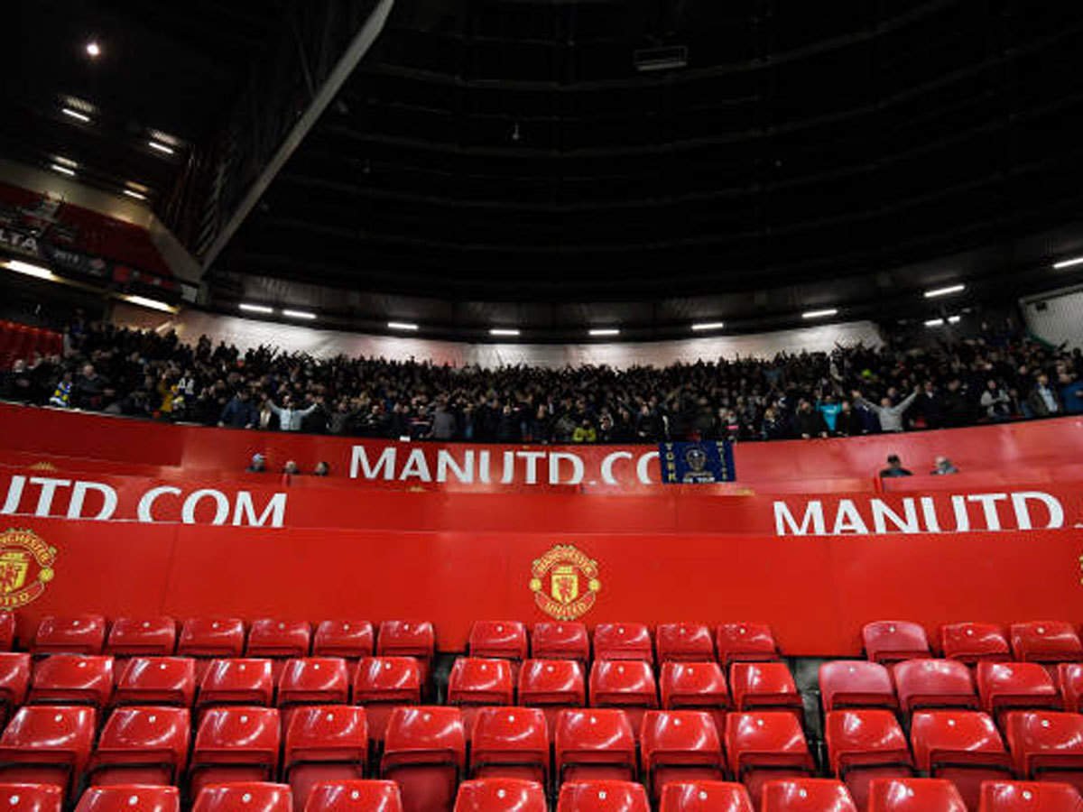 red devils have experienced long running problems with fans refusing to sit down in parts of their all seater old trafford ground photo afp