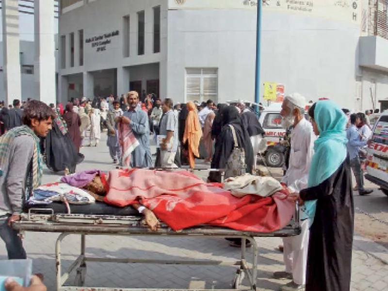 a patient lies on a stretcher outside jpmc as doctors at the hospital went on strike for two hours on thursday photo online a patient lies on a stretcher outside jpmc as doctors at the hospital went on strike for two hours on thursday photo online