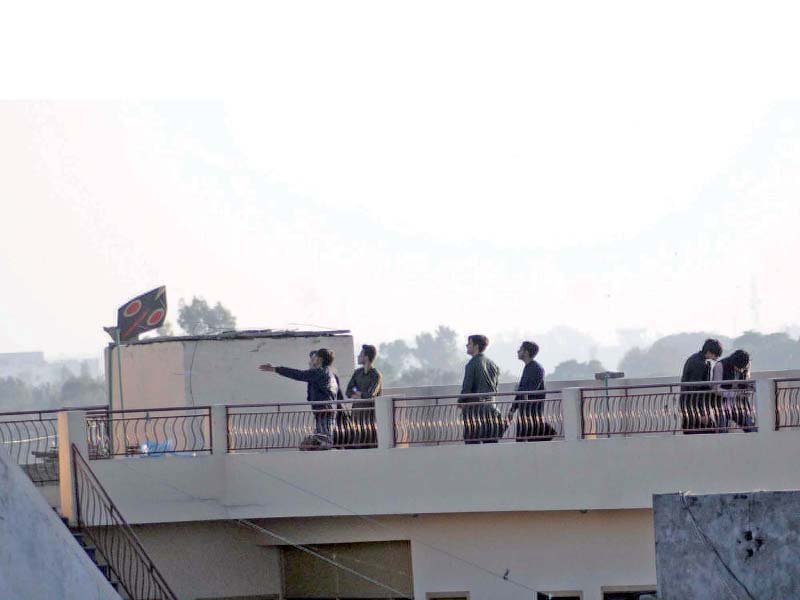 people enjoying kite flying despite ban in rawalpindi photo ppi