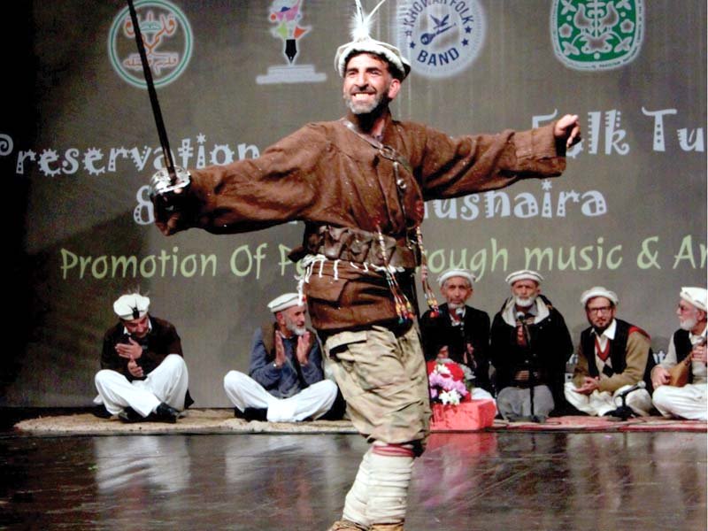 an artiste from chitral performs a cultural dance at pnca photo express
