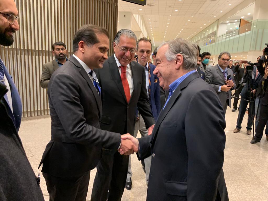 pakistan s permanent representative to un ambassador munir akram and farrukh iqbal director general united nations receive the unsg at islamabad airport photo express