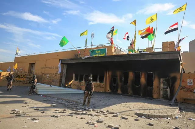 iraqi security forces stand guard in front the us embassy in the capital baghdad on january 1 2020 photo afp iraqi security forces stand guard in front the us embassy in the capital baghdad on january 1 2020 photo afp