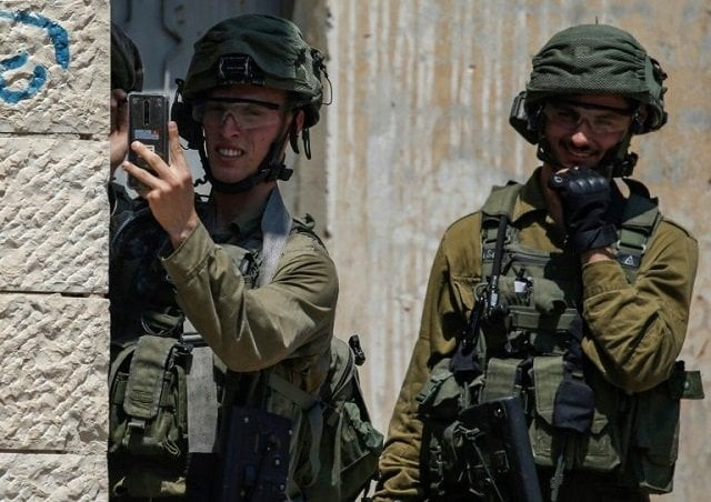 a cyber attack the israeli military said was launched by hamas sought to gain total access to soldiers 039 mobile phones photo afp a cyber attack the israeli military said was launched by hamas sought to gain total access to soldiers 039 mobile phones photo afp