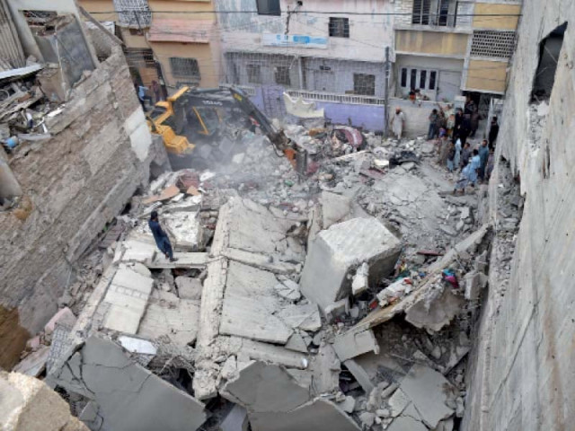 a five storey building collapsed in liaquatabad on tuesday night however no casualties were reported as police had evacu ated the building earlier photo online a five storey building collapsed in liaquatabad on tuesday night however no casualties were reported as police had evacu ated the building earlier photo online