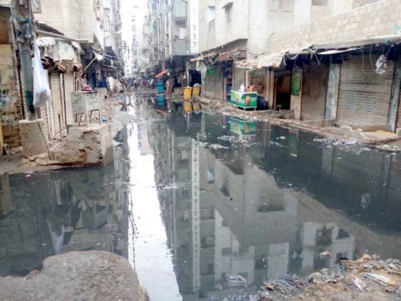 various areas in lyari continue to remain submerged in sewage water due to a faulty sewerage system photo express