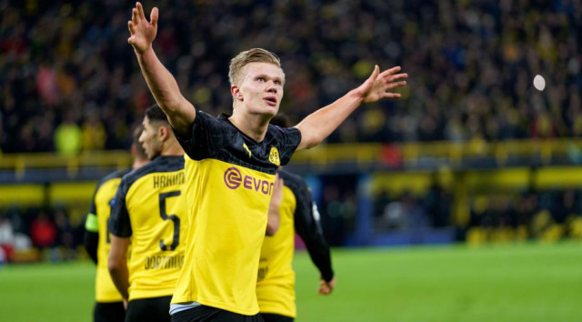 norwegian sensation continued his remarkable rise by scoring both goals in dortmund 039 s 2 1 defeat of the visitors photo afp norwegian sensation continued his remarkable rise by scoring both goals in dortmund 039 s 2 1 defeat of the visitors photo afp