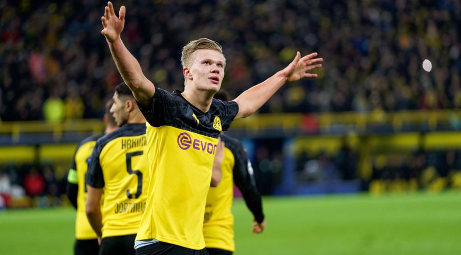 norwegian sensation continued his remarkable rise by scoring both goals in dortmund 039 s 2 1 defeat of the visitors photo afp