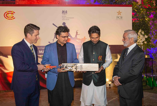 senator faisal javed presents a bat signed by prime minister imran khan to sangakkara photo express