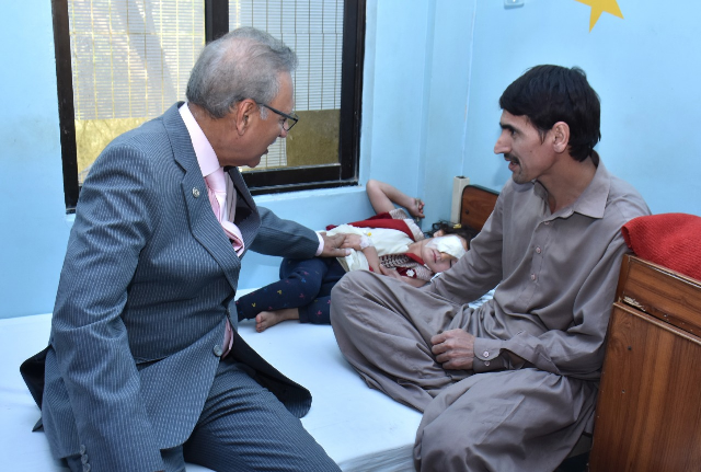 president alvi visits lrbt hospital in karachi 039 s korangi area photo express