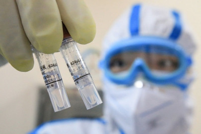 china finds spike in coronavirus cases in two jails officials fired
