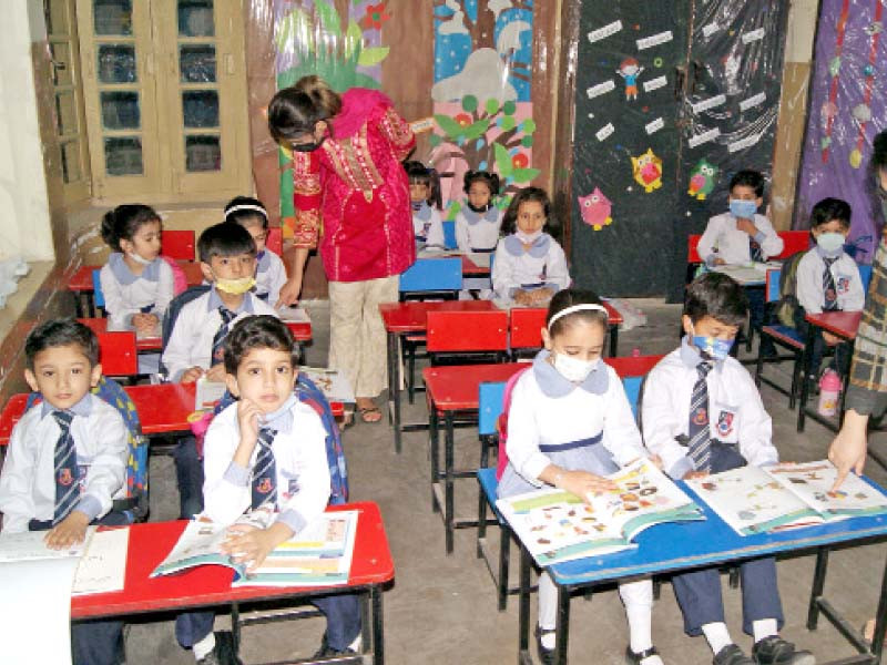 children attend a class at a government school as educational institutes reopen after remaining closed due to covid 19 pan demic photo online