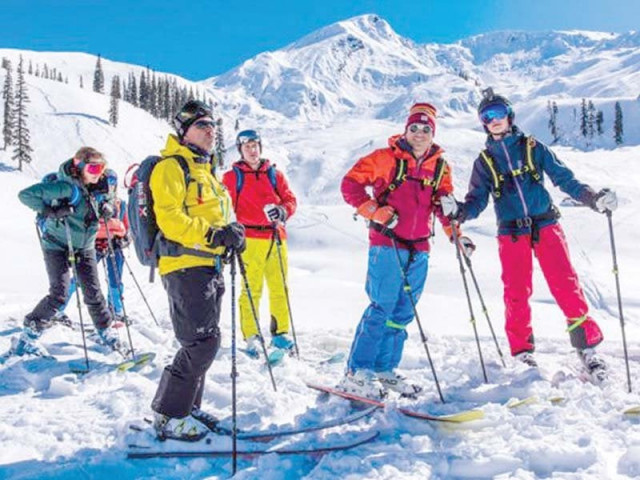 foreign skiers including dignitaries pose for photographs after participating in the week long heliski expedition on the slopes of shogran photo express foreign skiers including dignitaries pose for photographs after participating in the week long heliski expedition on the slopes of shogran photo express