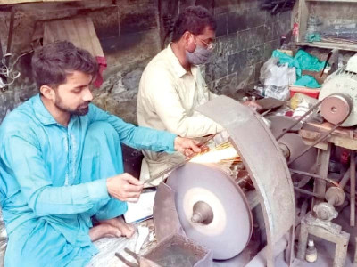 blacksmith family sharpens knives cleavers for eid blacksmith family sharpens knives cleavers for eid