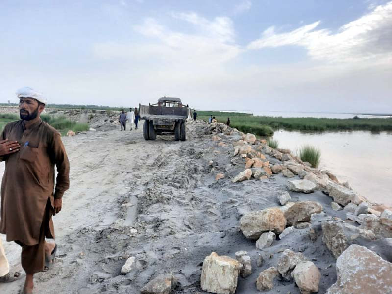 the district administration deploys heavy machinery at the riverbanks in the district a 32 kilometres flood protection em bankment and dozens of related structures are being continuously monitored photo express