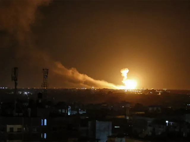 a ball of fire is seen following an israel airstrike at rafah in the southern gaza strip photo afp a ball of fire is seen following an israel airstrike at rafah in the southern gaza strip photo afp