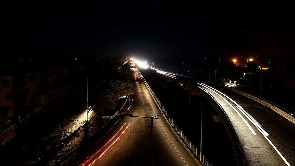 Homes across the country were plunged into darkness at about midnight. PHOTO: EPA