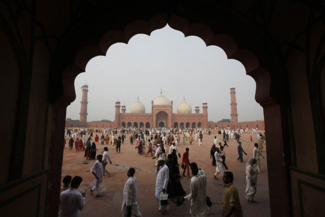 muslims walk near the badshahi mosque after attending a mass prayer for eid al adha in lahore pakistan photo reuters muslims walk near the badshahi mosque after attending a mass prayer for eid al adha in lahore pakistan photo reuters
