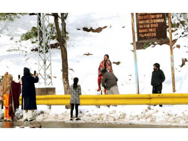 tourists enjoy a bright day out in murree as the snow lies sparkling in the sunlight photo app file tourists enjoy a bright day out in murree as the snow lies sparkling in the sunlight photo app file