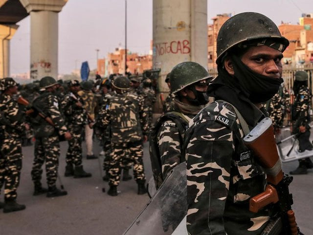 paramilitary troops patrol in a riot affected area after clashes erupted between people demonstrating for and against a new citizenship law in new delhi india february 25 2020 photo reuters paramilitary troops patrol in a riot affected area after clashes erupted between people demonstrating for and against a new citizenship law in new delhi india february 25 2020 photo reuters