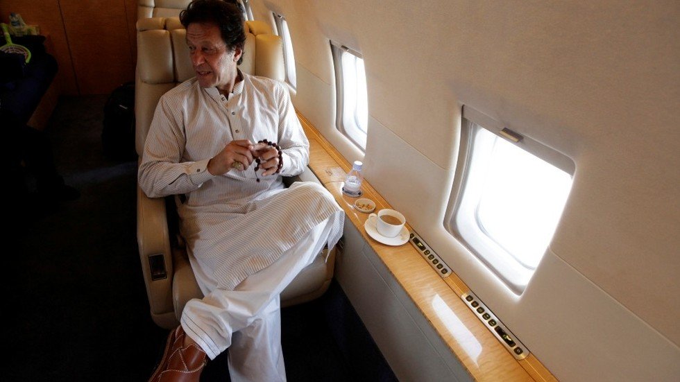 a reuters file photo of imran khan in a plane