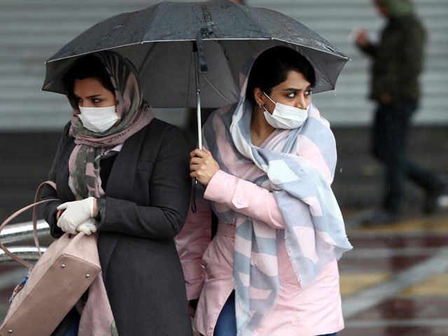 iranian women wear protective masks to prevent contracting coronavirus as they walk in the street in tehran iran february 25 2020 photo reuters