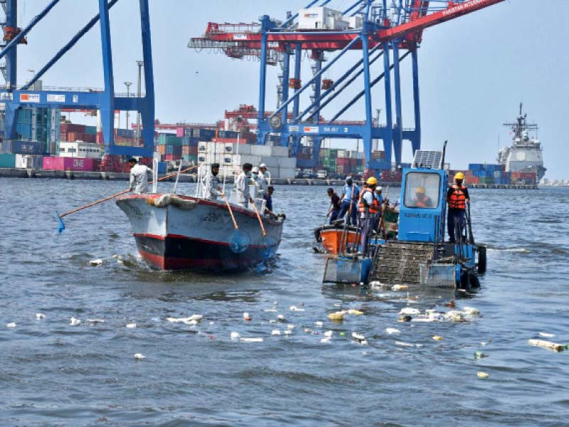 pakistan navy personnel conduct a harbour cleaning exercise to mark the world oceans day photo express