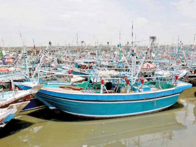 boats are moored at keamari jetty as fishermen were advised against going into the sea due to a storm warning photo jalal qureshi express boats are moored at keamari jetty as fishermen were advised against going into the sea due to a storm warning photo jalal qureshi express