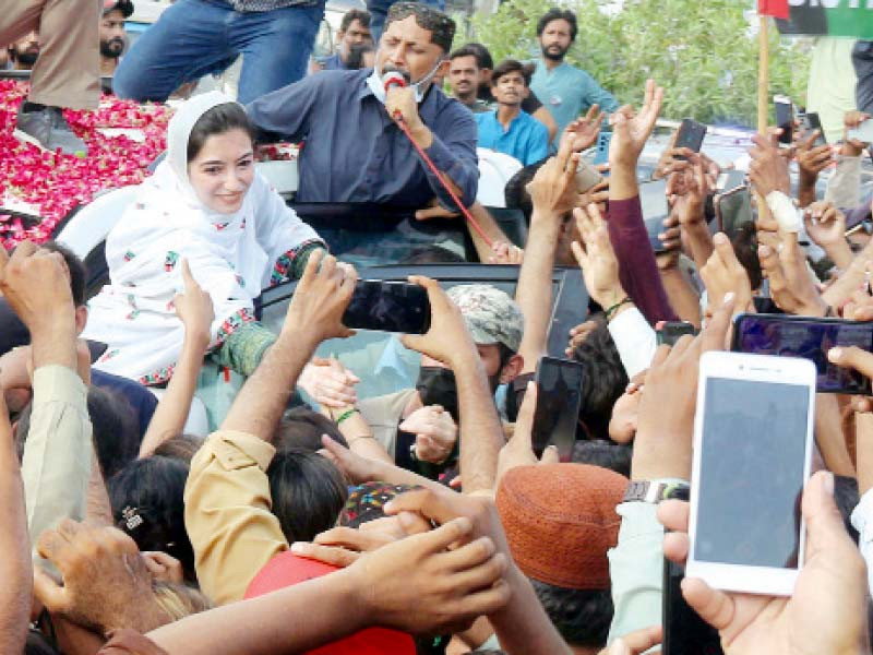 ppp leader aseefa bhutto shakes hands with a supporter during a rally in the qasimabad area of hyderabad on wednesday photo online