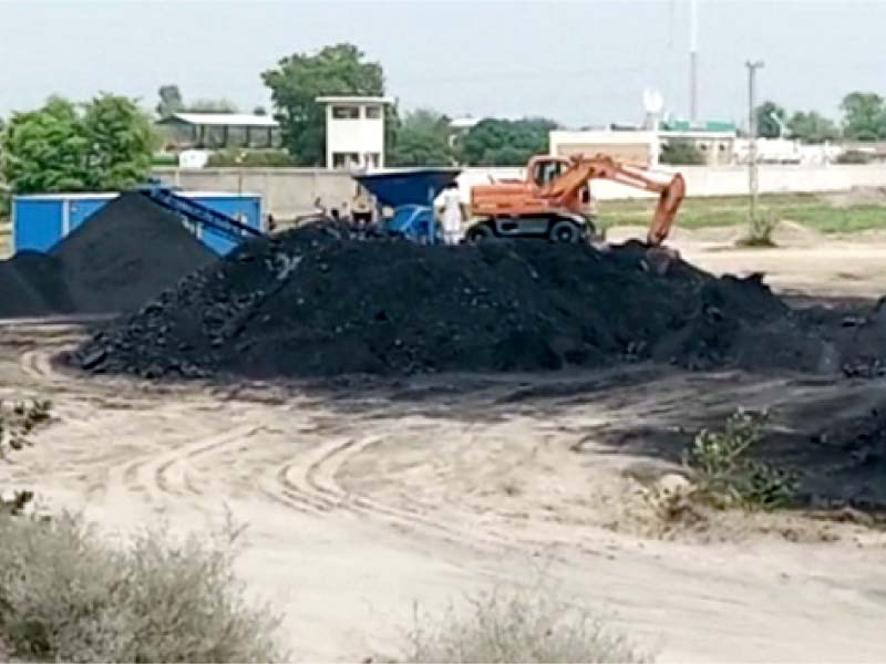 vehicles work on a new coal station near the kundian railway junction the station intends to bring back some of kundian junction s past glory photo express