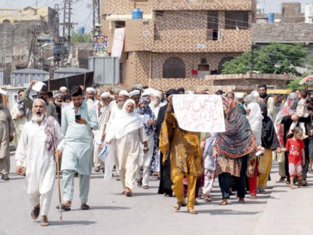 residents of dhoke ratta area take part in the protest against high taxes and inflated bills in rawalpindi photos online express residents of dhoke ratta area take part in the protest against high taxes and inflated bills in rawalpindi photos online express