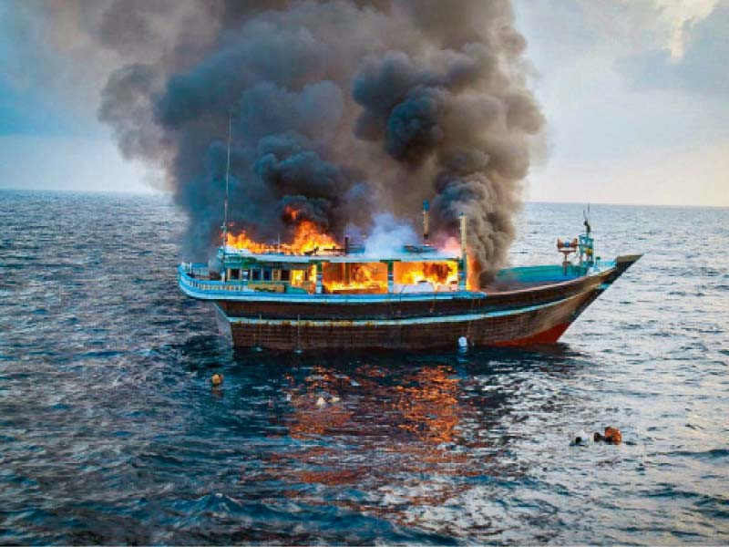 suspected drug smugglers set their boat on fire and jumped into the sea to destroy evidence pmsa officials said photo express