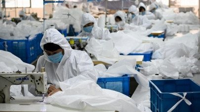 in virus hit china coat maker adapts to make hazmat suits in virus hit china coat maker adapts to make hazmat suits