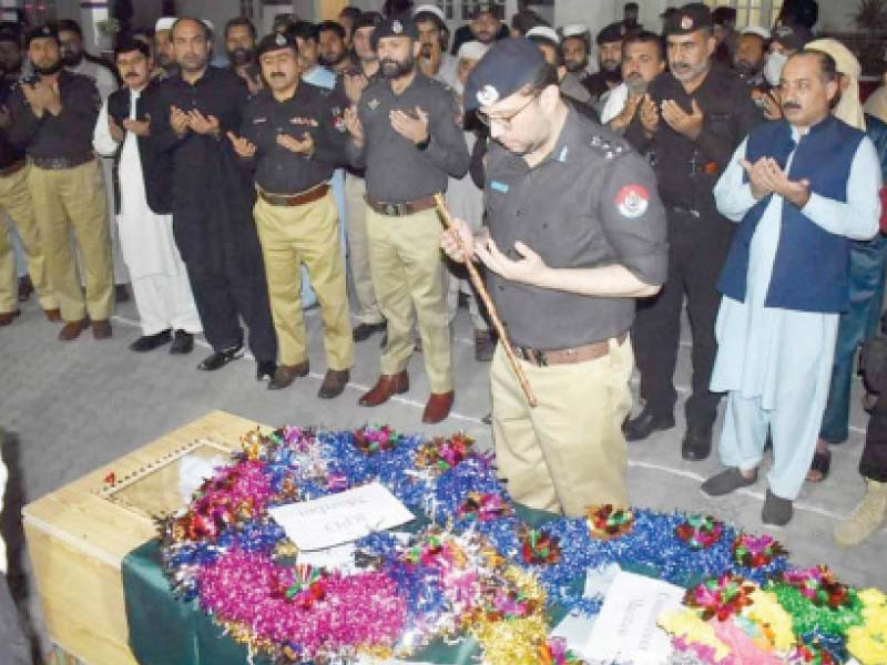 funeral prayers for the slain si were offered at the mardan police lines with full honours photo express