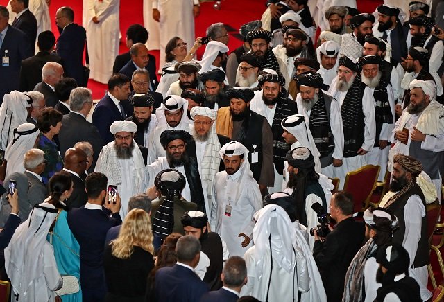 members of the taliban delegation arrive to the signing of a us taliban agreement in the qatari capital doha photo afp