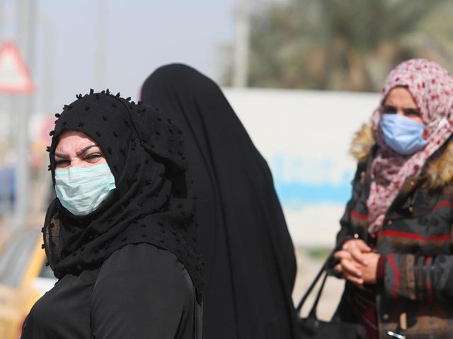 iraqi women wear protective face masks following the coronavirus outbreak as they walk in babylon iraq february 27 2020 photo reuters