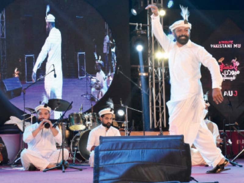 members of hunza dawoodi band perform at the three day pakistan music festival which concluded at pakistan arts council karachi on monday photo express