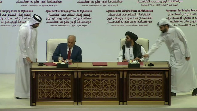 afghan peace deal being signed photo screenshot afghan peace deal being signed photo screenshot
