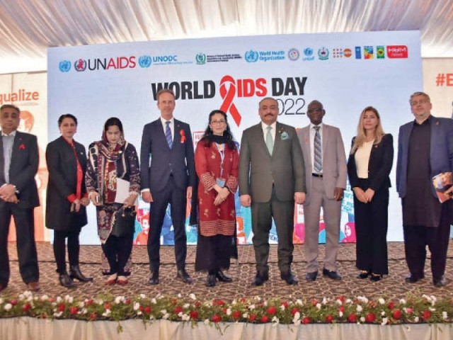 participants of an event organised by the federal health ministry to mark world aids day 2022 pose for a group photo photo express participants of an event organised by the federal health ministry to mark world aids day 2022 pose for a group photo photo express