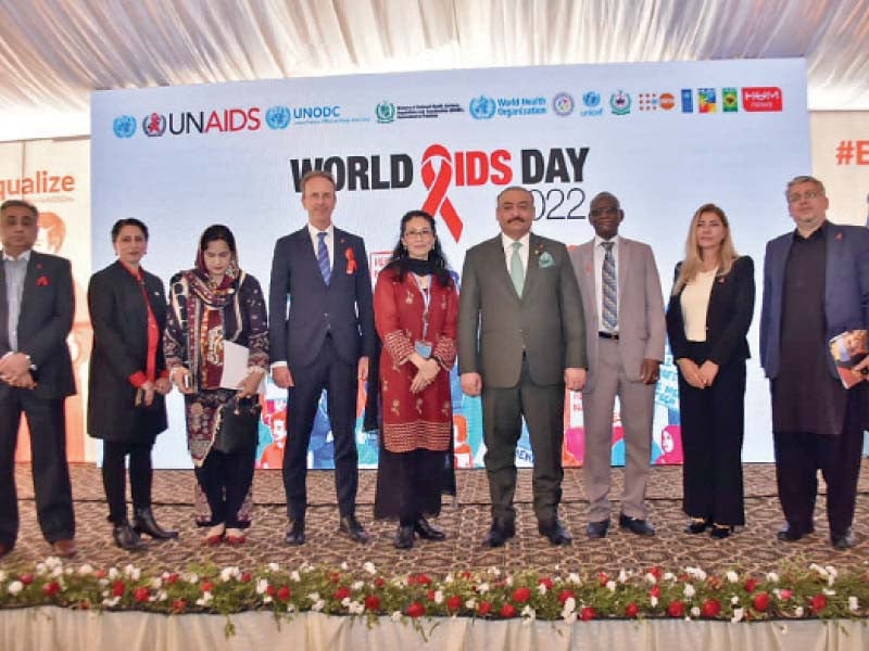 participants of an event organised by the federal health ministry to mark world aids day 2022 pose for a group photo photo express