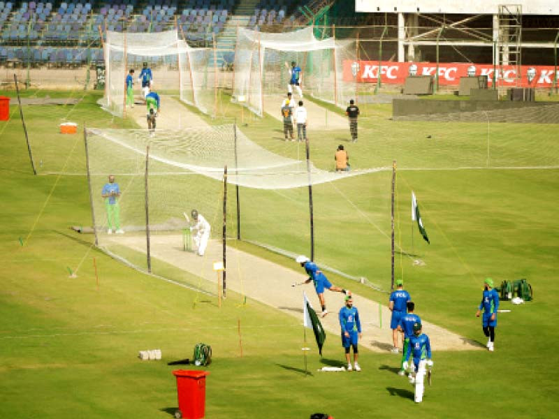 pakistani cricketers take part in a training session ahead of their third test match against england at the national stadium photo afp