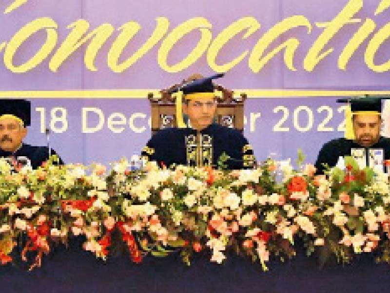 bahria university rector vice admiral retd asif khaliq and honoured guests sit on stage at the 18th convocation of the varsity photo express