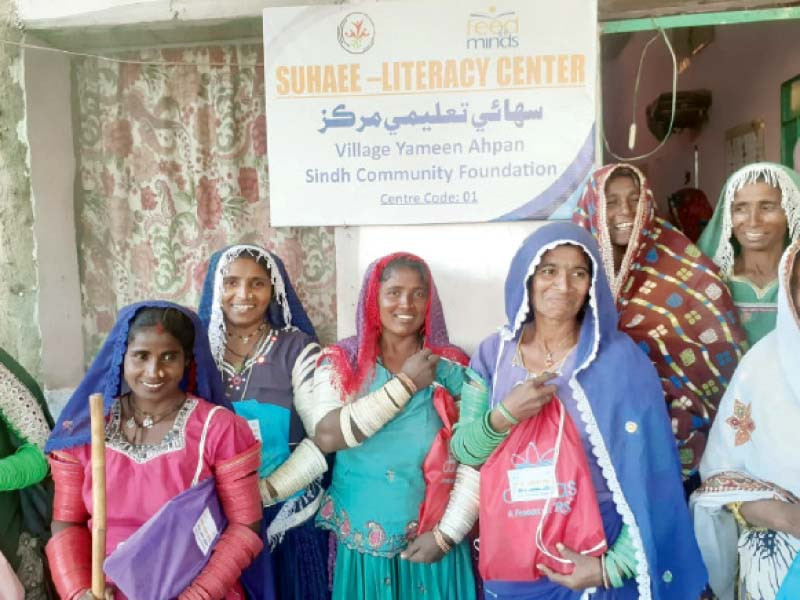 women cotton pickers of matiari district express joy on the launch of a programme under which they will learn how to read and write photo express