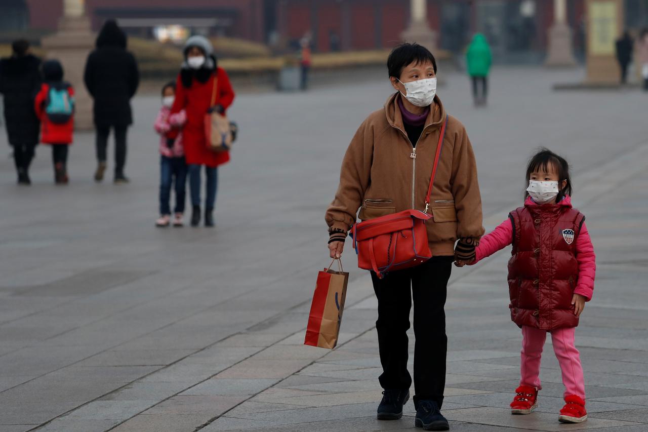 china reports 35 more virus deaths 573 new cases photo reuters