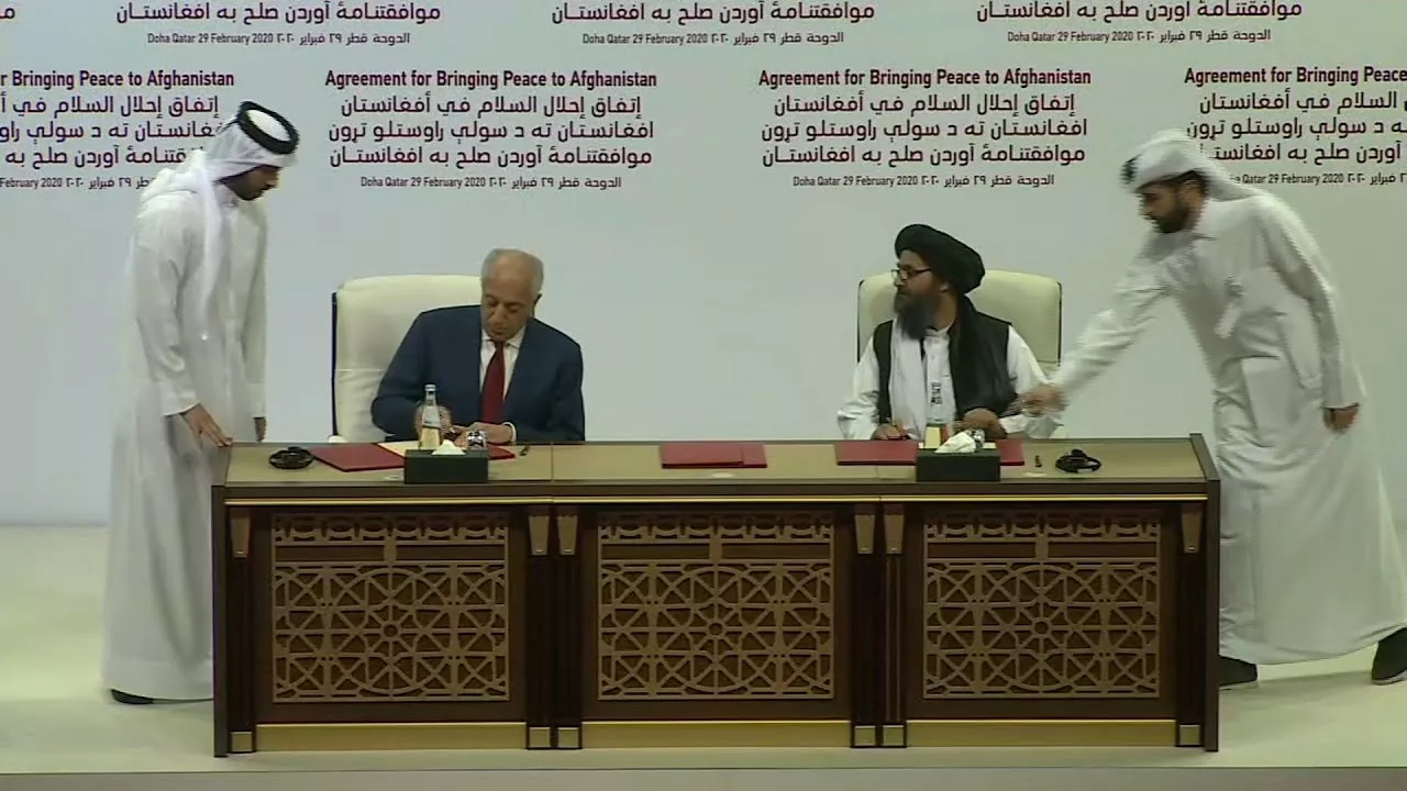 afghan peace deal being signed photo screenshot afghan peace deal being signed photo screenshot