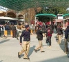 police officers control the crowd after a suicide blast in a mosque at police line area in peshawar pakistan january 30 2023 reuters fayaz aziz