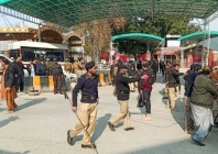 police officers control the crowd after a suicide blast in a mosque at police line area in peshawar pakistan january 30 2023 reuters fayaz aziz