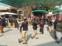 police officers control the crowd after a suicide blast in a mosque at police line area in peshawar pakistan january 30 2023 reuters fayaz aziz