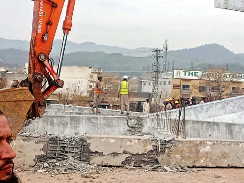 girders of the under construction bridge collapsed and turned into piles of unusable debris photos express