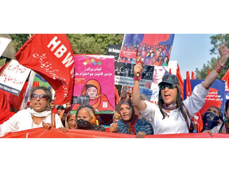 activists march on international women day while sheema kirmani speaks at a press conference at karachi press club in hyderabad folk singers perform at aurat azadi march outside hyderabad press club photos express