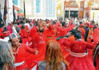 devotees perform dhammal devotional dance during the urs of lal shahbaz qalandar in sehwan on monday photos ppi